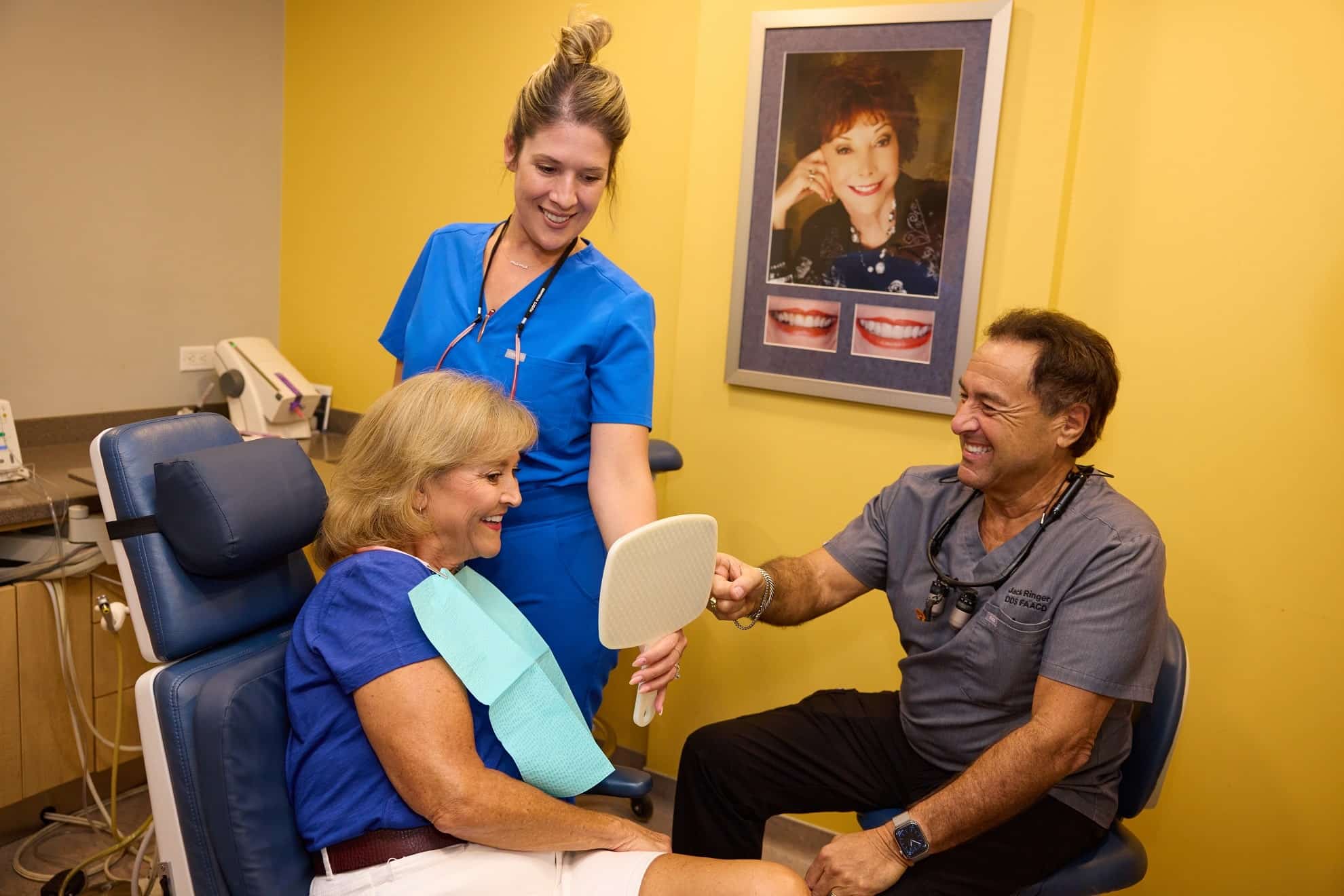 Dr. Jack Ringer and team member helping a patient feel comfortable during a dental visit in Anaheim Hills California