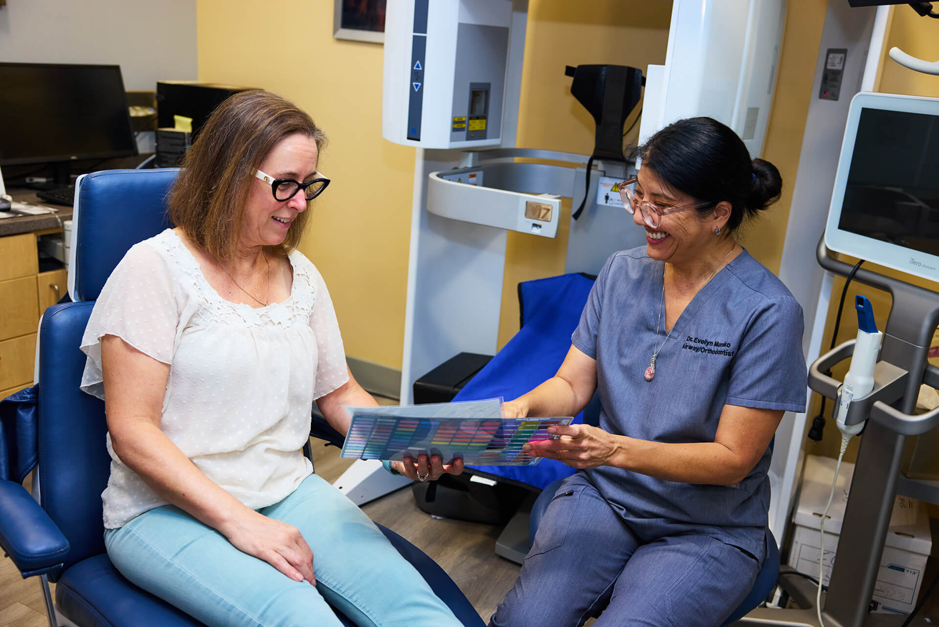 Dental team member assisting a patient during a comfortable dental visit at Advanced Smile Design in Anaheim Hills California
